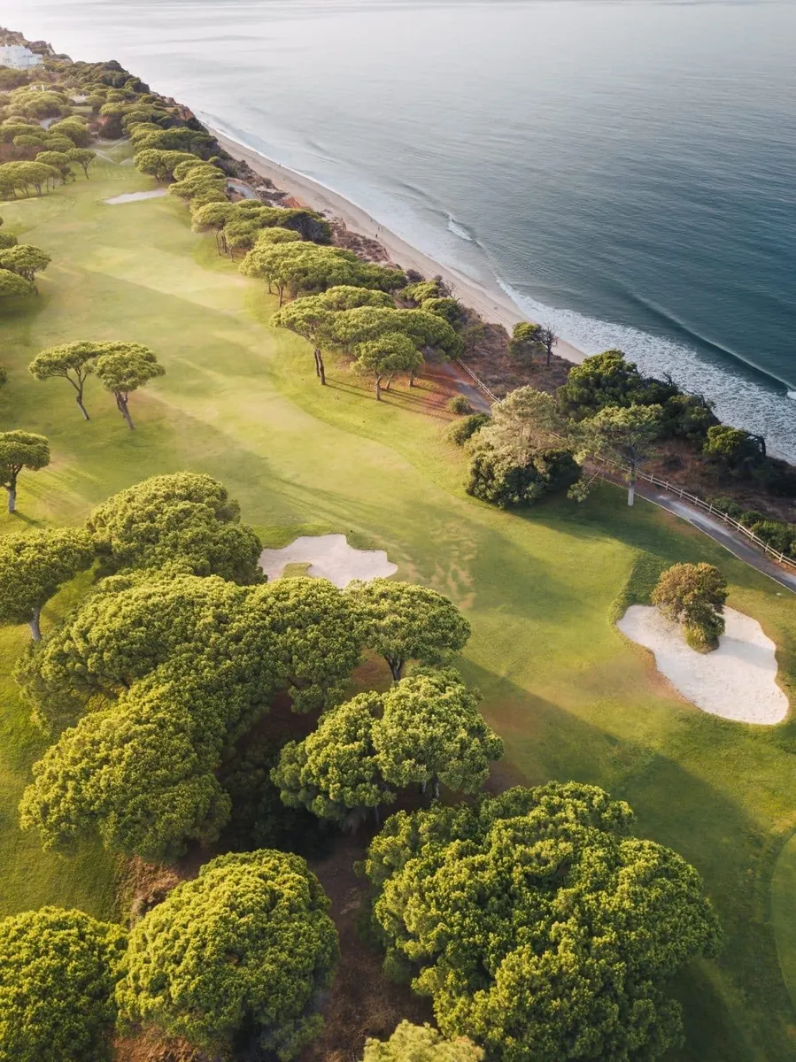 A cliff-top golf fairway beside the Atlantic at Pine Cliffs.