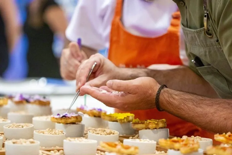 Chef preparing small dishes for an event at Pine Cliffs.