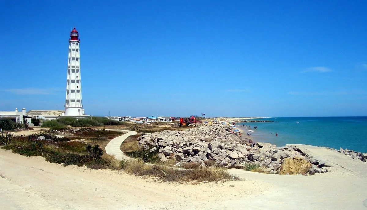 Cabo de Santa Maria lighthouse above the coast on Farol island.