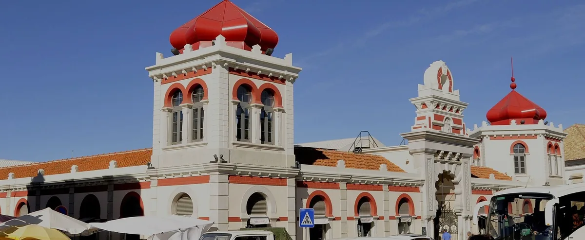 The white façade and red domed towers of Loulé’s municipal market.