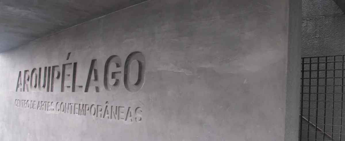 The volcanic-stone exterior of Arquipélago - Centro de Artes Contemporâneas.